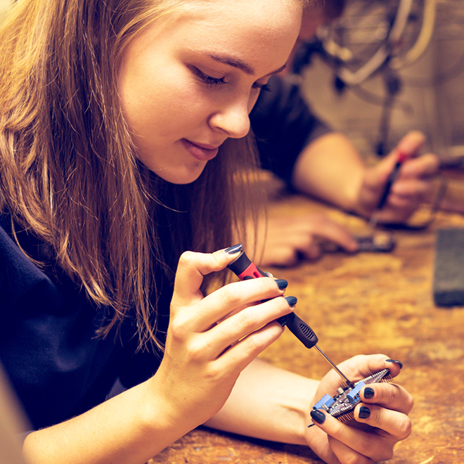 girl working on project